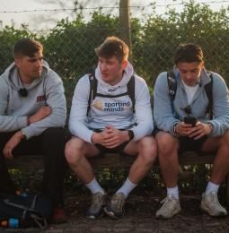 Photo of Ben sitting with his friends