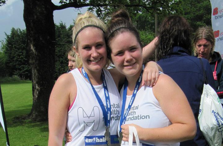 Two MHF runners with medals