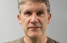 Portrait photo of Lee Knifton in a jumper